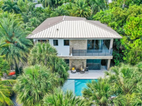 Experience Warmth & Comfort in our Stylish Balinese Waterfront Home